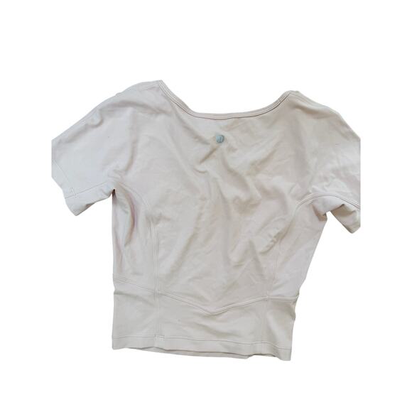 (4) $68 Lululemon Nulu Cropped Slim Yoga Short Sleeve Pink Mist - Picture 8 of 8